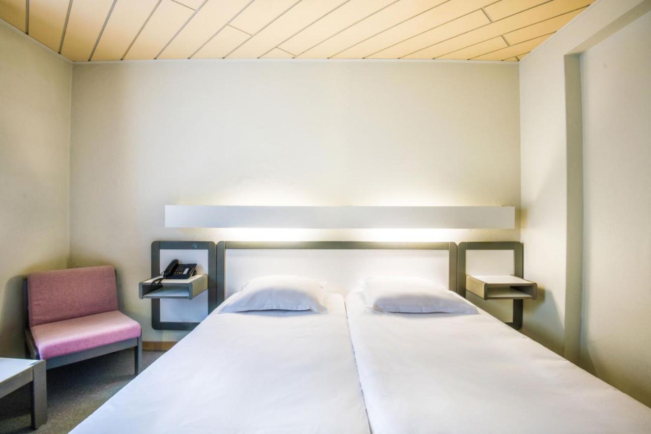 Tweepersoonskamer met 2 Aparte Bedden